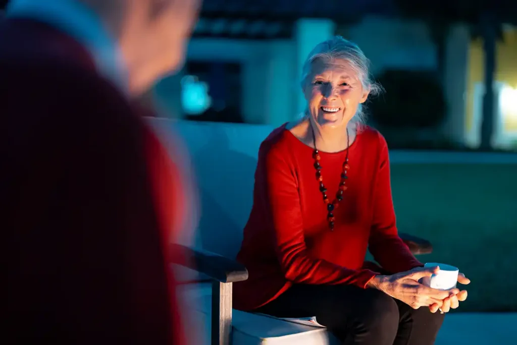 woman drinking coffee outdoors