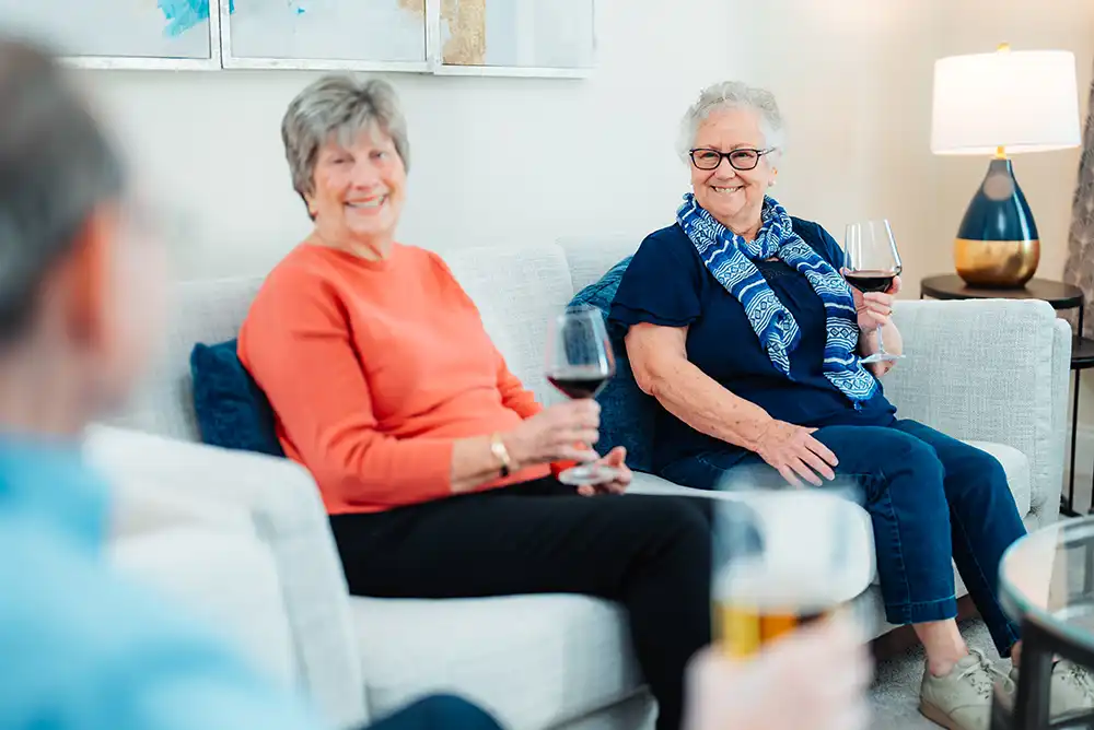 Drinking wine at a party in an apartment
