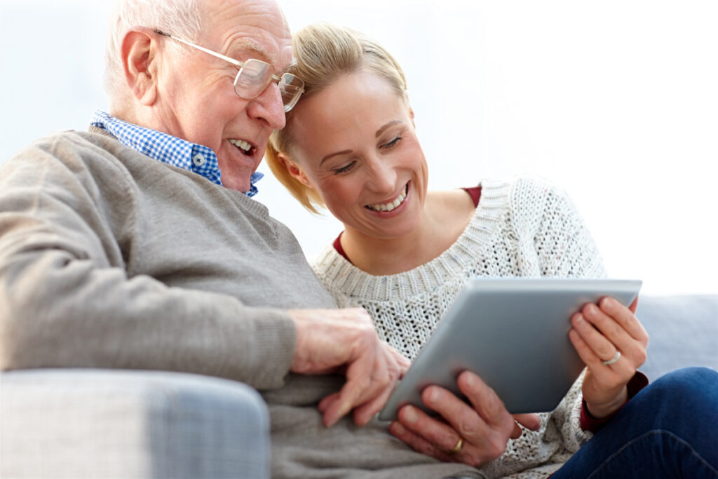 Senior man and woman on tablet