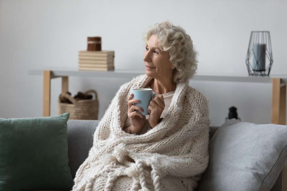 Senior woman relaxing in her apartment